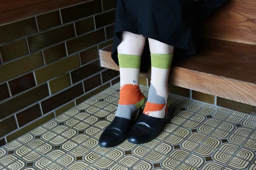The Tortoise and the Hare story sock in Oatmeal color